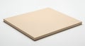 A blank light beige hardcover book lies flat on a white surface Royalty Free Stock Photo