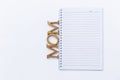 Blank lined journal notebook and wooden texture letter isolate on white background Royalty Free Stock Photo
