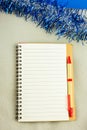 Blank lined notepaper on a blue Christmas background Royalty Free Stock Photo