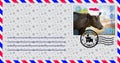 Blank mailing envelope with a stamp depicting a bull wearing a Santa Claus hat. Content for the designer