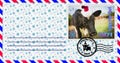 Blank mailing envelope with a stamp depicting a bull wearing a Santa Claus hat. Content for the designer