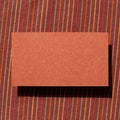 Blank memo pad, empty paper on fabric background Royalty Free Stock Photo