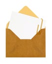 Blank message or invitation card with paper clip and brown manila envelope, close up Royalty Free Stock Photo