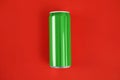 Blank metal green can on color background, top view. Royalty Free Stock Photo