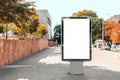 Empty vertical billboard layout outdoors in a park for placing an advertisement, poster or banner Royalty Free Stock Photo