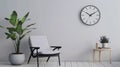 Blank mockup of a classic black and white wall clock with a round face and simple elegant design.
