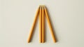 Blank mockup of a set of pencils arranged to form a triangle creating a visually dynamic display.