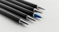 Blank mockup of a set of sleek and professional exeive pens in black blue and silver