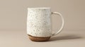Blank mockup of a speckled stoneware beer mug with a comfortable handle and unique design. Royalty Free Stock Photo