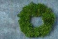 Blank natural fir xmas wreath on rustic background