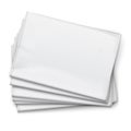 Blank newspapers pile on white background.