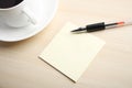 Blank note with ball pen and coffee Royalty Free Stock Photo