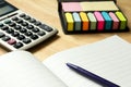 Blank note book with pen, calculator, memo Royalty Free Stock Photo