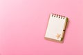 Blank note book with starfish or seashells on a pink background , summer vaction concept Royalty Free Stock Photo