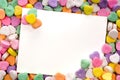 Blank note card surrounded, framed by candy hearts Royalty Free Stock Photo