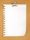 Blank note paper on cardboard background