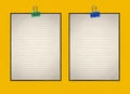 Blank note paper with clip on yellow art paper background Royalty Free Stock Photo