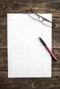 Blank note paper with pen on table Royalty Free Stock Photo