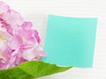 Blank notebook with beautiful artificial flower Royalty Free Stock Photo