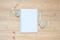 blank notebook with lightbulb and crumbled paper on wooden table, Top view and copy space. Idea, Creative, Innovation, Solution, S