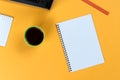 Blank notebook page, laptop, coffee cup and pencil. Blank writing pad for ideas and inspiration Royalty Free Stock Photo