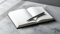 Blank Notebook and Pen on a Concrete Surface Royalty Free Stock Photo