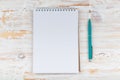 blank notebook with pen on white wooden table Royalty Free Stock Photo