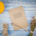 Blank notebook with pencil and autumn pumpkins Royalty Free Stock Photo
