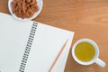 Blank notebook, pencil, drink, snack Royalty Free Stock Photo