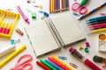 Blank notebook with School office supplies on a desk Royalty Free Stock Photo