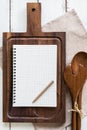 Blank notebook with wooden utensil Royalty Free Stock Photo