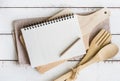 Blank notebook with wooden utensil Royalty Free Stock Photo