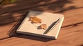 Blank notepad flat lay design with Autumn leaves and coffee cup on wooden table Royalty Free Stock Photo