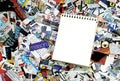 Blank Notepad and magazine clippings Royalty Free Stock Photo