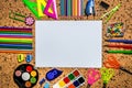 Blank notepad over school and office supplies on office table. Top view with copy space. Back to school Royalty Free Stock Photo