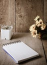 Blank notepad on wooden table