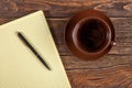 Blank notepad on a wooden table