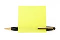 Blank notepaper stick on a pen Royalty Free Stock Photo