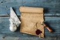 scrolls of old paper on a wooden table. Antique background Royalty Free Stock Photo