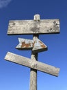 blank old wooden sign board with rusty arrow Royalty Free Stock Photo