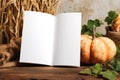 Blank Open Book on Rustic Table with Autumn Pumpkin and Leaves. Royalty Free Stock Photo