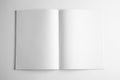 Blank open book on white, top view. Mock up for design