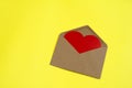 Blank open envelope with heart on yellow background Royalty Free Stock Photo