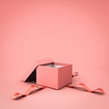 Blank open gift box or present box with red ribbon isolated on pink pastel color background Royalty Free Stock Photo