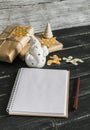 Blank open Notepad, ceramic Santa Claus, Christmas gifts