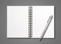 Blank open spiral notebook and pen isolated on dark grey Royalty Free Stock Photo