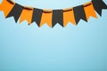 Blank and orange party flags for Halloween decoration on blue background Royalty Free Stock Photo