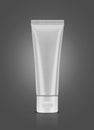 Blank packaging aluminum toothpaste tube isolated on gray