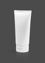 Blank packaging cosmetic tube isolated on gray background Royalty Free Stock Photo