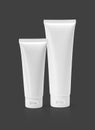 Blank packaging cosmetic tube isolated on gray background Royalty Free Stock Photo